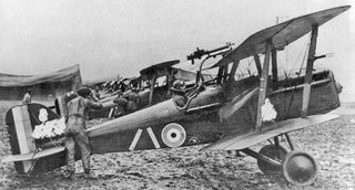S.E.5a during WWI. A wartime censor has obscured aircraft serial numbers in the photo.